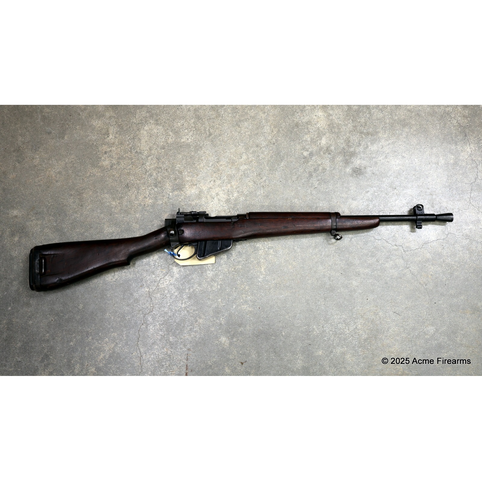 Enfield SMLE Jungle Carbine - No4 - Mark I* - 303BR - Bolt Action Rifle. 2 x 10 capacity detachable magazines, 3 x stripper clips, scope base and 303BR die set.  Not matching numbers.  Good condition.